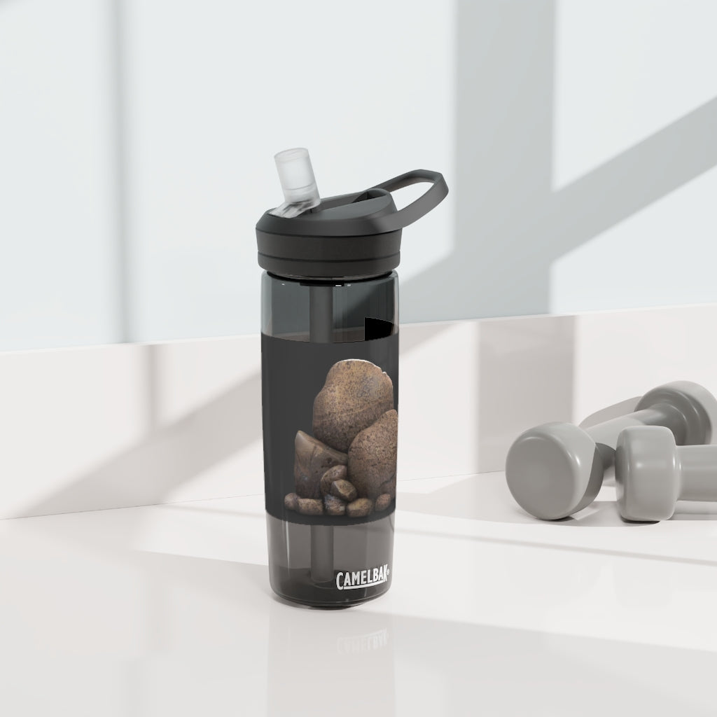 Rocks CamelBak Eddy® Water Bottle in 20oz and 25oz sizes, showcasing its durable Tritan™ material and spill-proof design.